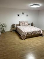 Posteľ alebo postele v izbe v ubytovaní Apartament cozy