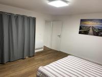Posteľ alebo postele v izbe v ubytovaní Apartament cozy