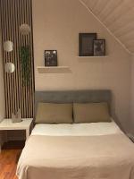 Posteľ alebo postele v izbe v ubytovaní VILLA KER BLEUENN * 10 PERSONNES * PISCINE * SAUNA