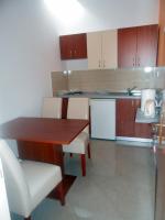 Kuchyň nebo kuchyňský kout v ubytování Apartments Mira