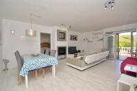 TV a/nebo společenská místnost v ubytování Apartment Playa de Aro con vistas al mar