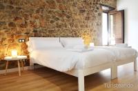 Posteľ alebo postele v izbe v ubytovaní Apartamento Llerandi 2A - con terraza y totalmente reformado en un edificio histórico