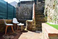 Patio alebo iná vonkajšia časť ubytovania Apartamento Llerandi 2A - con terraza y totalmente reformado en un edificio histórico