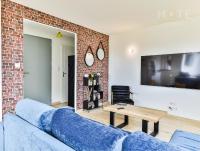 Televízia a/alebo spoločenská miestnosť v ubytovaní La Chaumoise : Villa neuve avec vue exceptionnelle