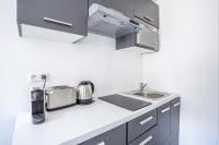 Kuchnia lub aneks kuchenny w obiekcie 143 - Urban Charming Flat in Center of Paris