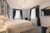 Posteľ alebo postele v izbe v ubytovaní Grand Hotel Principe Di Piemonte