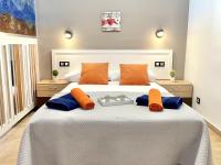 A bed or beds in a room at APARTBEACH ALBORAN 405 CON PISCINA y CLIMATIZADO