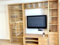 A television and/or entertainment centre at APARTBEACH ALBORAN 405 CON PISCINA y CLIMATIZADO