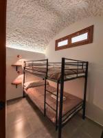 Posteľ alebo postele v izbe v ubytovaní La Madriguera Eco Caves