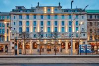 a large building in front of a street at Riu Plaza The Gresham Dublin in Dublin