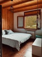 A bed or beds in a room at Apartaments Cel i Fusta