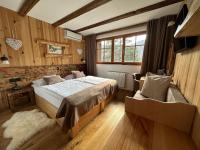 Ribno Alpine Hotelにあるベッド