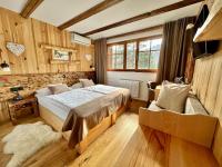 Ribno Alpine Hotelにあるベッド