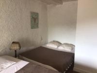 Posteľ alebo postele v izbe v ubytovaní jolie maison de caractère proche de Castres