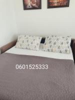 Llit o llits en una habitació de WING 3 apartman ,,BC ,,
