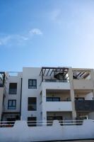 Balkón alebo terasa v ubytovaní Sunny Luxury Apartment with two great sunny - level terraces, two swimming pools, in a new complex Pueblo Majorero, close to Fuerteventura Golf Club, next to the beach , Atlantico Shopping Mall and casino in Caleta de Fuste