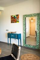 Posedenie v ubytovaní Sunny Luxury Apartment with two great sunny - level terraces, two swimming pools, in a new complex Pueblo Majorero, close to Fuerteventura Golf Club, next to the beach , Atlantico Shopping Mall and casino in Caleta de Fuste