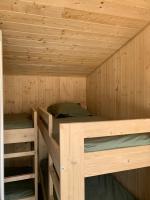 Posteľ alebo postele v izbe v ubytovaní La Petite Auberge Insolite