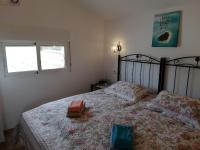 Postel nebo postele na pokoji v ubytování Casa Kalani