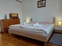 Posteľ alebo postele v izbe v ubytovaní Apartman Tinče