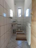 Kúpeľňa v ubytovaní Apartman Tinče