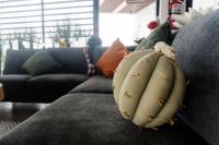 a bunch of bananas sitting on a couch at La Cima del Valle in Valle de Guadalupe