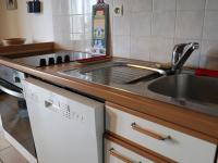 a kitchen with a sink and a counter top at Maison Jard-sur-Mer, 3 pièces, 5 personnes - FR-1-485-78 in Jard-sur-Mer