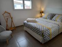 Posteľ alebo postele v izbe v ubytovaní Maison BELIZO, familiale ,calme et reposante.