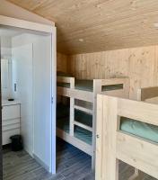 Posteľ alebo postele v izbe v ubytovaní La Petite Auberge Insolite