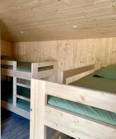 Posteľ alebo postele v izbe v ubytovaní La Petite Auberge Insolite