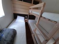 Posteľ alebo postele v izbe v ubytovaní Camping du Nizour