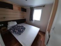 Posteľ alebo postele v izbe v ubytovaní Camping du Nizour
