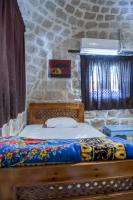 Postel nebo postele na pokoji v ubytování Zad Elmosafer Villa - Tunis Village
