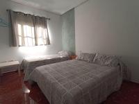 Posteľ alebo postele v izbe v ubytovaní Vivienda Agustín Durán