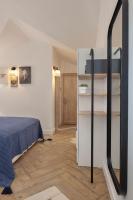 A bed or beds in a room at Ada Dreams City