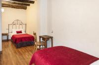 Ein Bett oder Betten in einem Zimmer der Unterkunft Apartaments Els Llacs