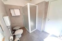 A bathroom at Hotel Da Tino