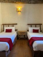 Ein Bett oder Betten in einem Zimmer der Unterkunft Apartaments Els Llacs