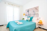 Postel nebo postele na pokoji v ubytování Empuriabrava Apartaments - nº 9