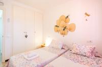 Postel nebo postele na pokoji v ubytování Empuriabrava Apartaments - nº 9