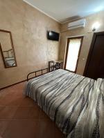 Posteľ alebo postele v izbe v ubytovaní Agriturismo Il Pozzo