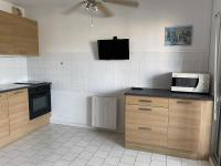 a kitchen with a microwave and a counter top at Studio Sète, 1 pièce, 4 personnes - FR-1-338-406 in Sète