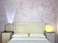 Posteľ alebo postele v izbe v ubytovaní Giulia apartment and room