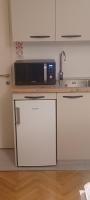Kuchyň nebo kuchyňský kout v ubytování Room Nada