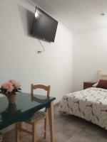 Posteľ alebo postele v izbe v ubytovaní Malaga Ensuites City Centre
