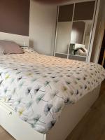 Posteľ alebo postele v izbe v ubytovaní Appartement - Bastia