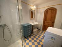 a bathroom with a toilet and a sink at Maison Fouras, 6 pièces, 8 personnes - FR-1-709-39 in Fouras