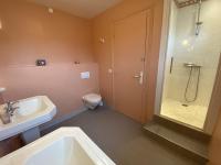 a bathroom with a sink and a shower and a toilet at Maison Fouras, 6 pièces, 8 personnes - FR-1-709-39 in Fouras