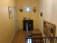 a hallway with a stairway with a room at Maison Fouras, 6 pièces, 8 personnes - FR-1-709-39 in Fouras