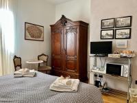 Posteľ alebo postele v izbe v ubytovaní Giulia apartment and room